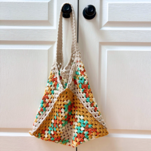 Clementine Market Tote farmer's market crochet tote in cream, orange, blue and yellows