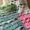 lacy crochet pattern scarf in blues, pinks, greens and creams