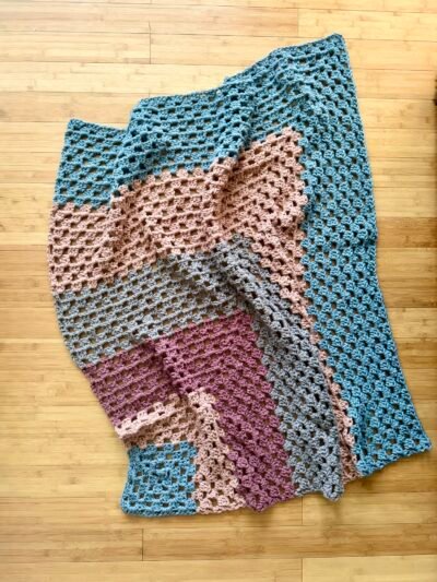 granny stitch chunky blanket in earthy tones