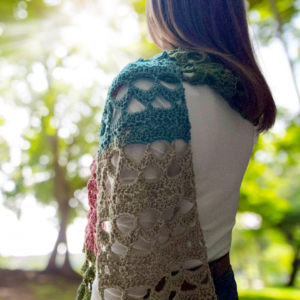 lacy crochet extra long multi-colored scarf on woman