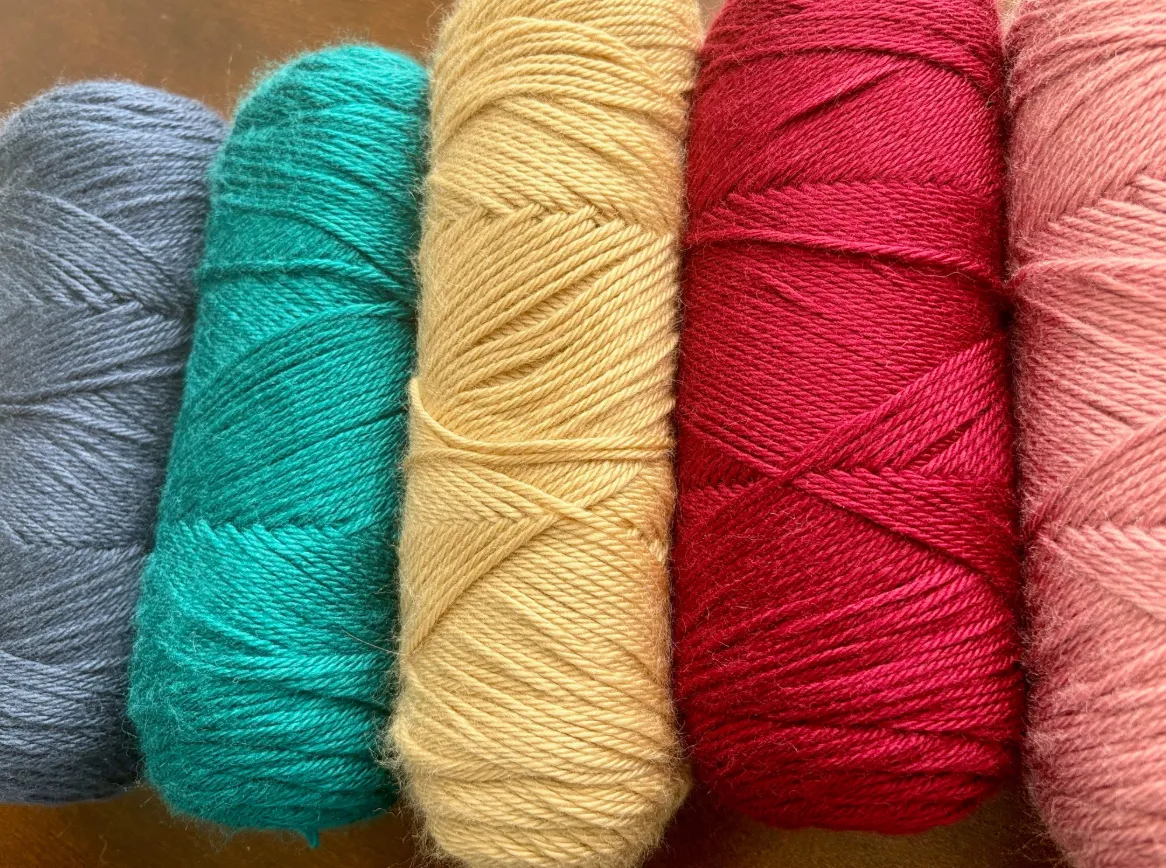 brightly colored yarn skeins for a beginner crocheter
