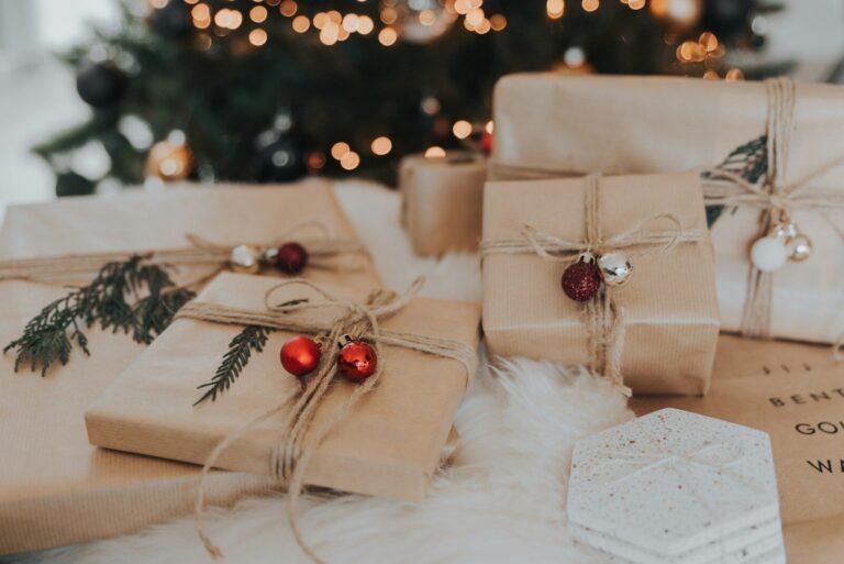 handmade crochet gifts packaged in craft paper under tree