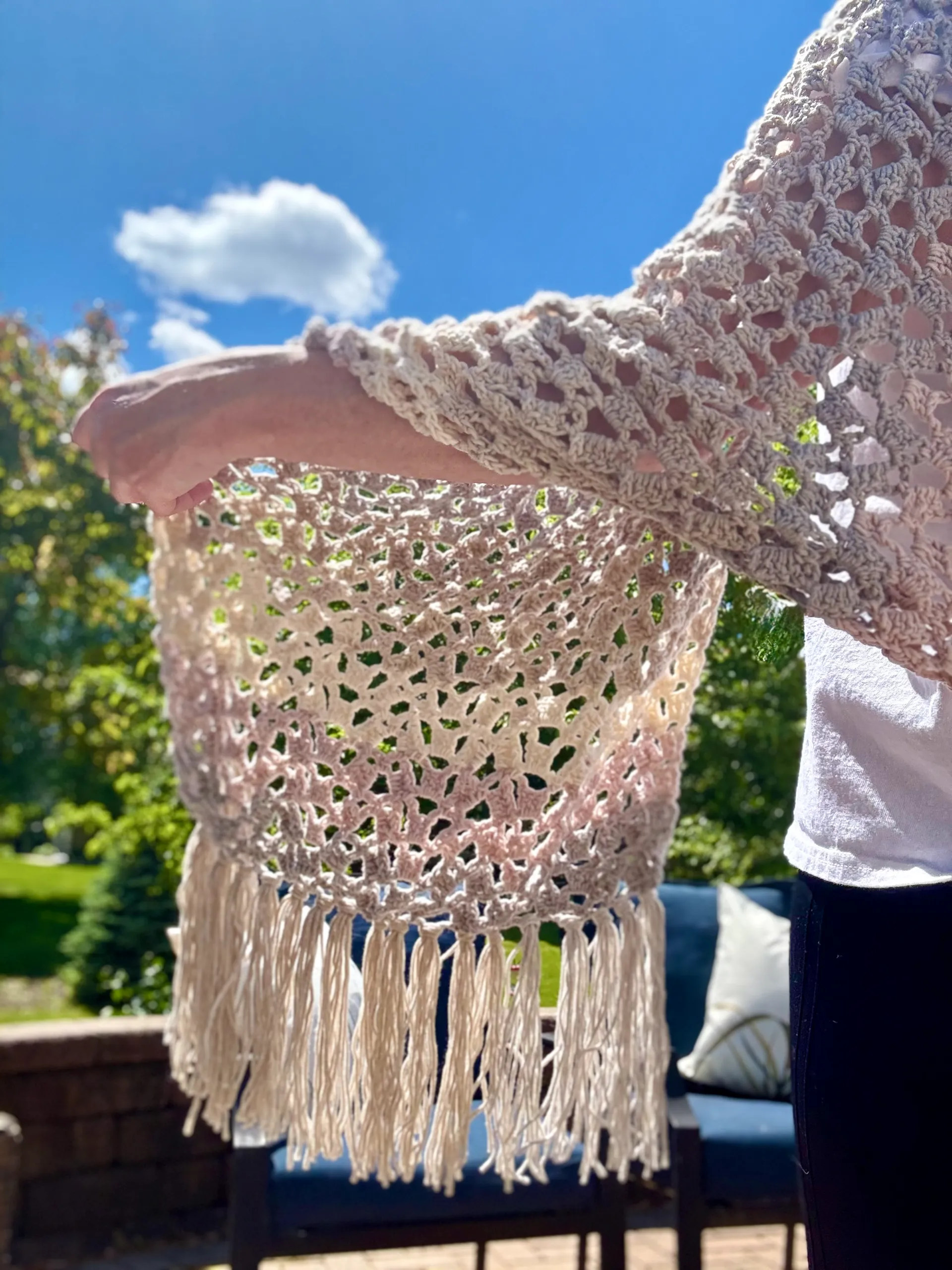 summer cotton yarn crochet wrap over woman's arm